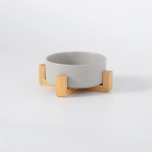 Comedero de cerámica con base de madera