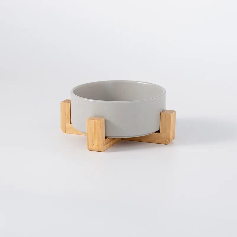 Comedero de cerámica con base de madera